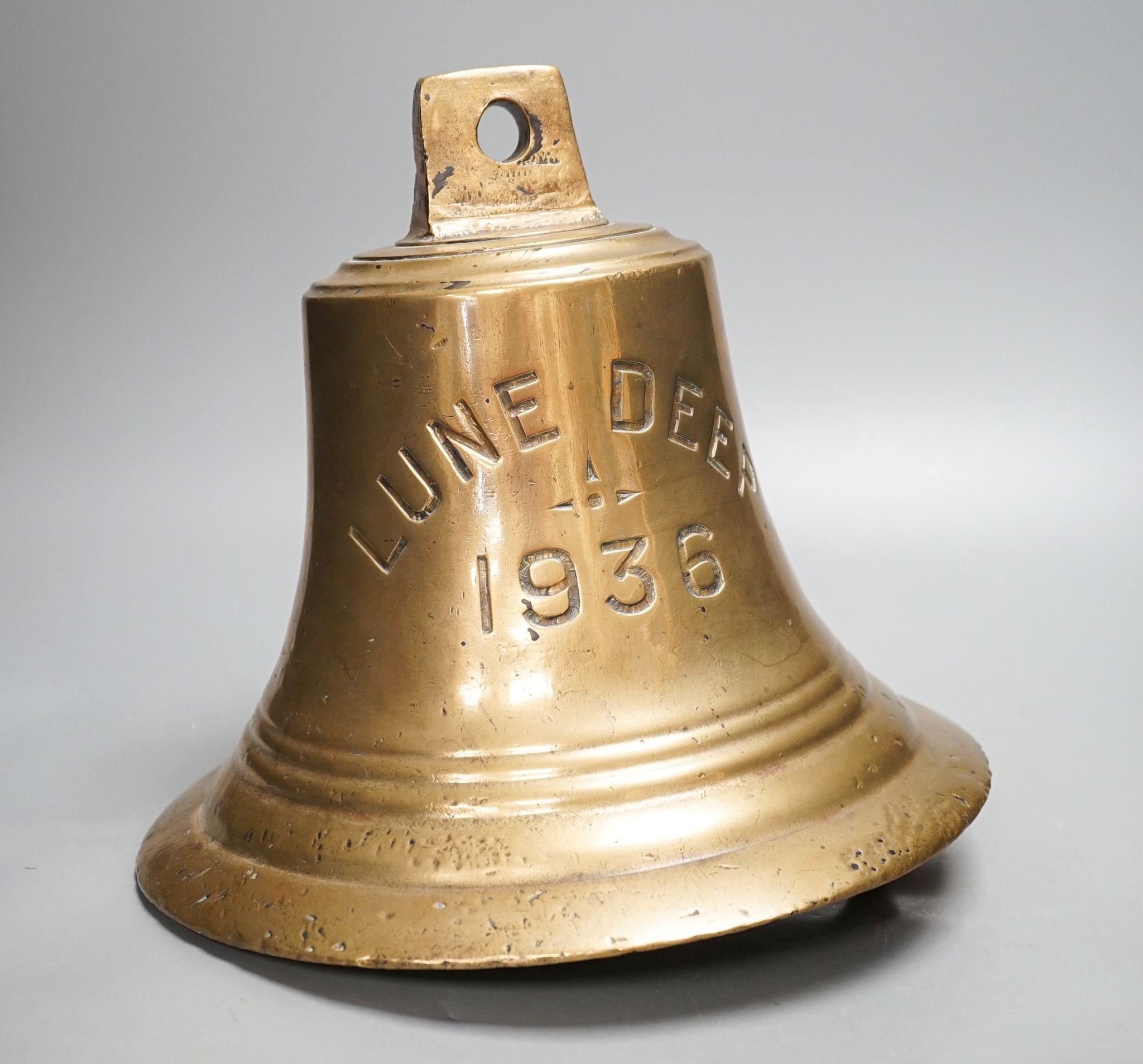 A bronze ship's bell, ‘Lune Deep 1936’, 25cm, MV `Lune Deep' O.N. 164624, was a 190ft self-propelled hopper barge built in 1936.